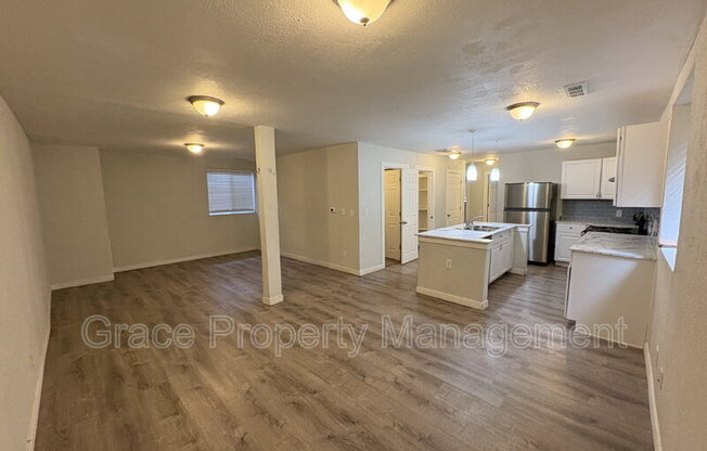 9011 E 12 AVE