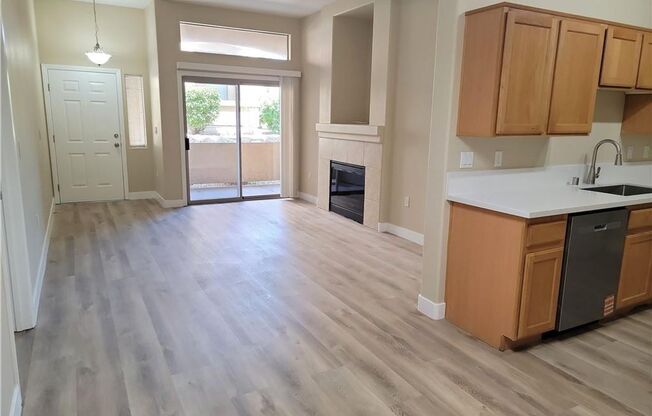 GORGEOUS SW 1st FLOOR UNIT IN GATED COMMUNITY!!
