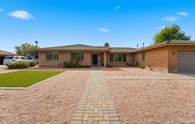 Welcome to this beautiful 4-bedroom, 3-bathroom home in Tempe Arizona!