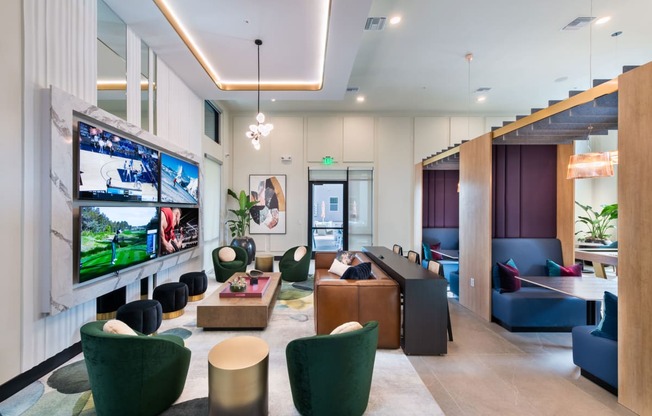 a living room with furniture and a large tv