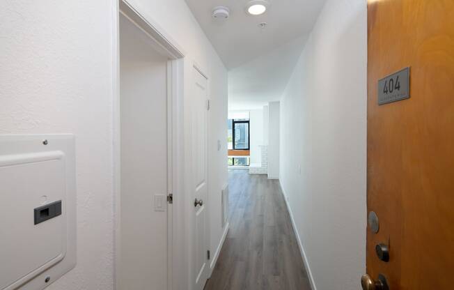 a view of the hallway from the front door