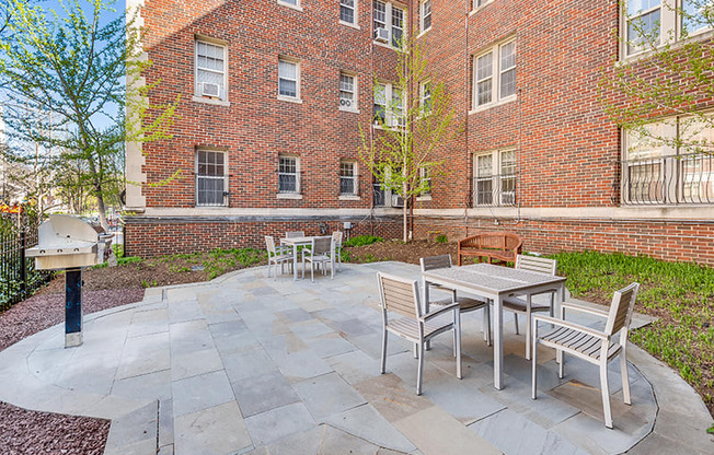 Courtyard with grills  at The August in Washington, DC 20037