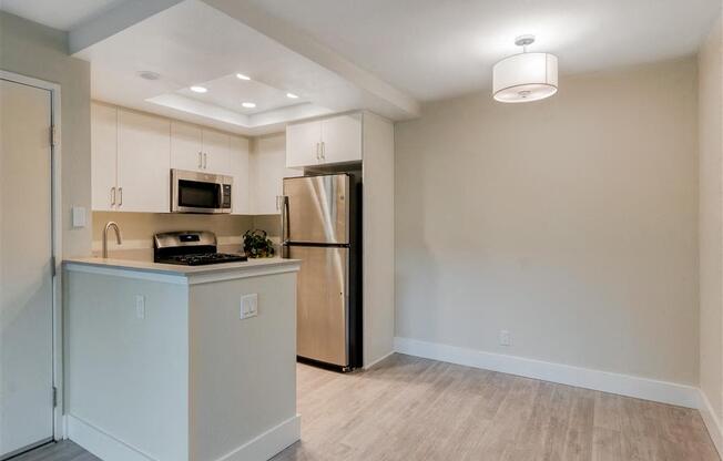 a kitchen or kitchenette at sonder east 5th at Laguna Gardens Apts., Laguna Niguel, CA