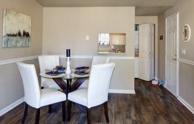 a dining room with a table and chairs at 2000 Lake Washington Apartments, Washington, 98056