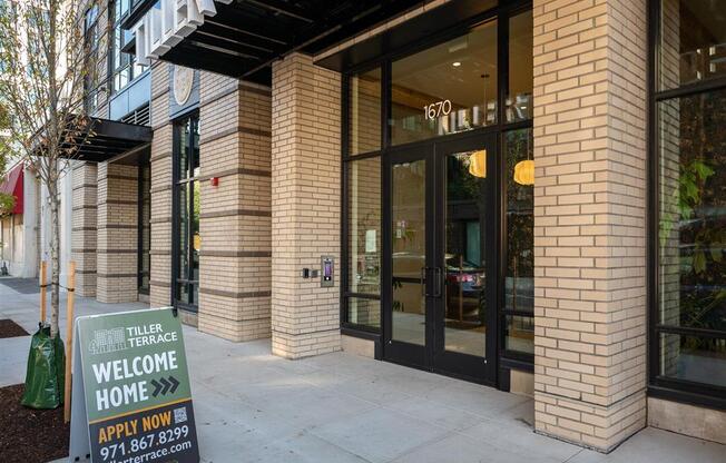 a building with a welcome home sign in front of it