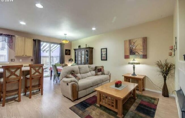 Spacious 3-Bedroom Townhouse with Open Living Areas and Private Patio