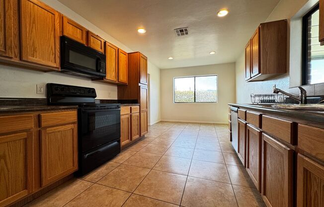 Eastside (Broadway and Wilmot) 3 bedroom, 2 bath home with large blocked yard and A/C!