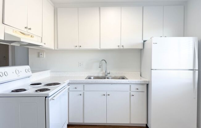 Modern Lakeside Living | 1 & 2 Bedroom Apartments with Parking and Pool!