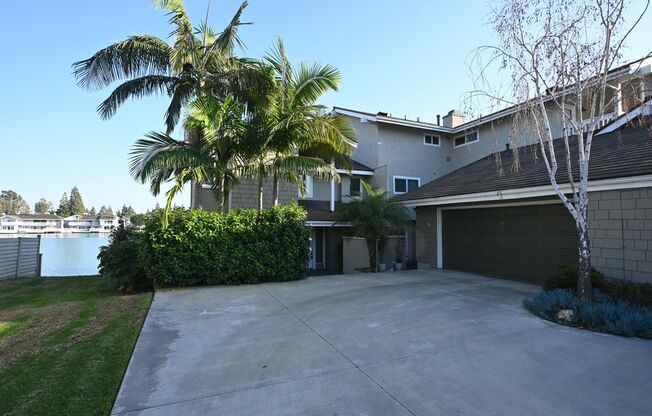 BREATHTAKING LAKE VIEW! Gated Lake community 3 bedroom plus 1 Den 2.5 bath Home