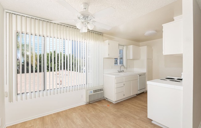 Dining Room with Hardwood Floors and Fan