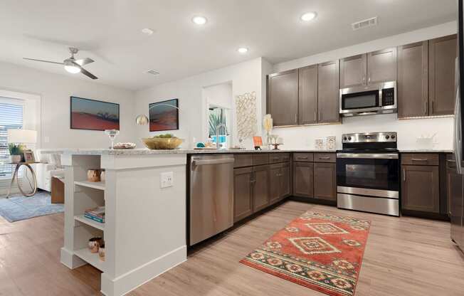 fully furnished kitchen area of an apartment at ironridge