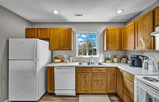 Fully-Equipped Kitchen with Wood Cabinets