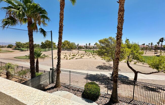 GORGEOUS 2 STORY HOME WITH A GRAND ENTRY & GOLF COURSE VIEW LOCATED INSIDE THE COMMUNITY OF RHODES RANCH
