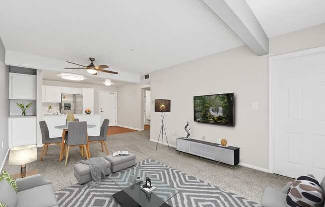 our apartments offer a living room with a couch a coffee table and a dining table