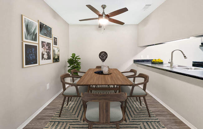 a room with a couch and a table in front of a mirror