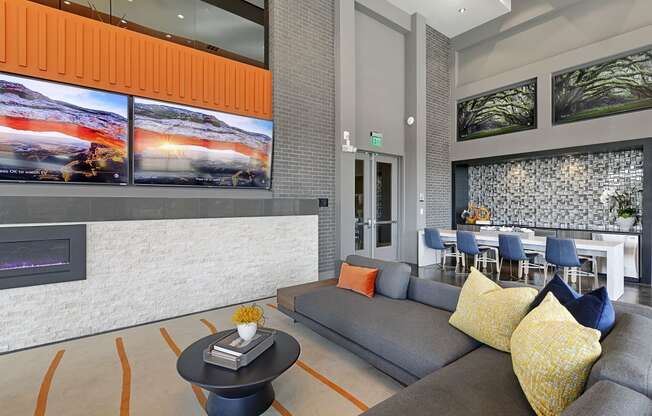 a rendering of a lobby with couches and a coffee table