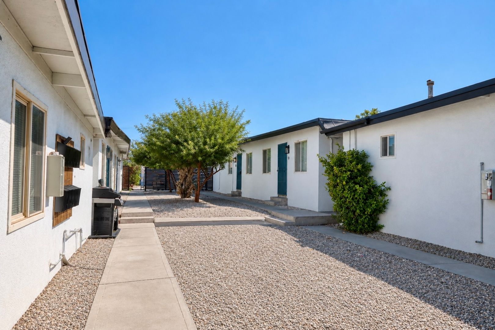Gated Courtyard Living with Easy Freeway Access
