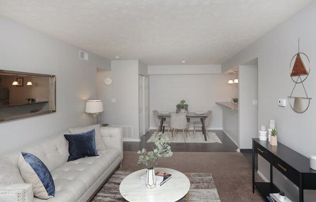 a living room with a couch and a coffee table