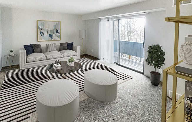 a living room with white furniture and a striped rug