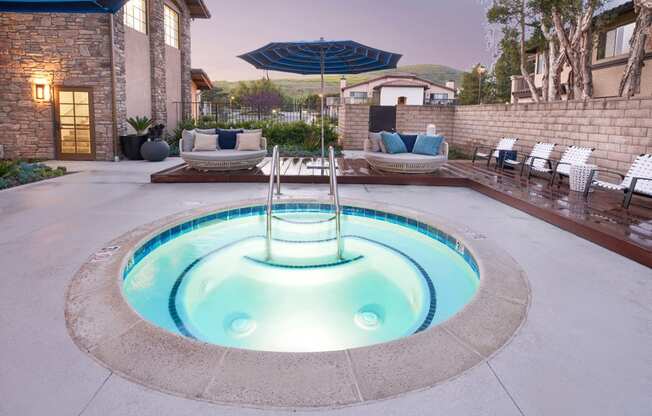 Apartments for Rent Thousand Oaks CA - The Knolls - Jacuzzi with Lounge Chairs, Daybeds, and Clubhouse