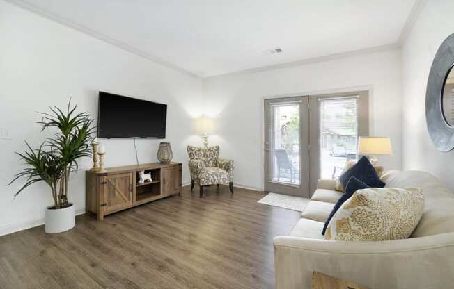 Spacious Living Area with Hardwood-Style Flooring