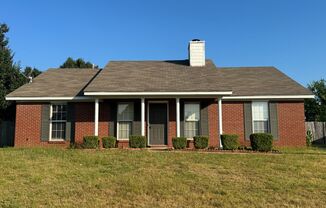 Three bedroom two bath with an enormous backyard.