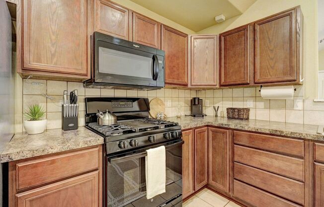 Turnkey Living in Owasso, Stylish Furnished 3-Bed Home with Pond & 2-Car Garage!