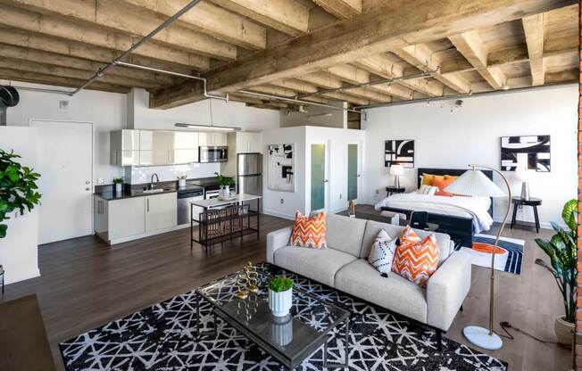a living room and kitchen in a loft
