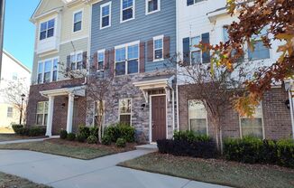 Move-in ready, end-unit, townhome Located in Hadley at Arrowood Station