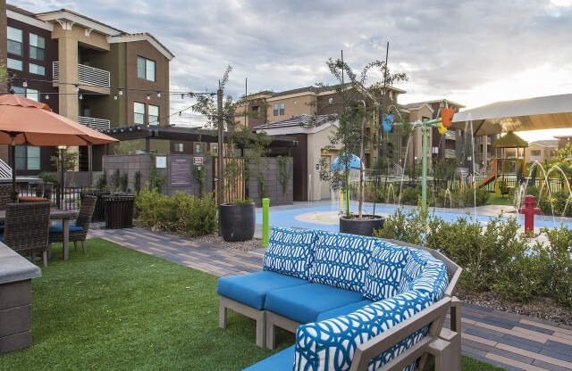 Outdoor seating with view of the splash pad