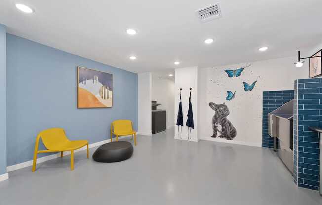 A room with blue walls and a yellow chair.