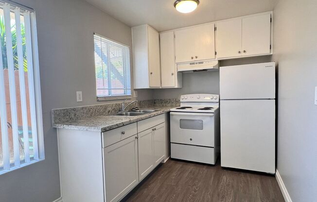 225 E 1st St.