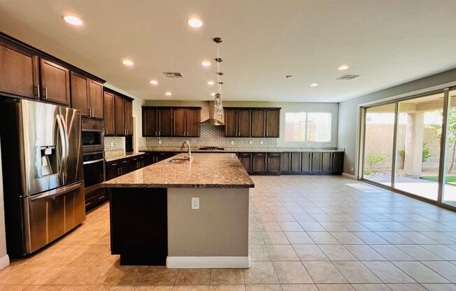 Stunning and spacious 4 Bed 3 bath 3,602 SQFT home inside Rhodes Ranch Guard Gated Golf Course Community!