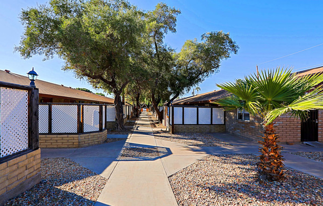 A sunny day at a residential area with a clear blue sky.