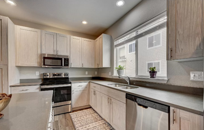 Charming town-home style condo Coming June 2026!