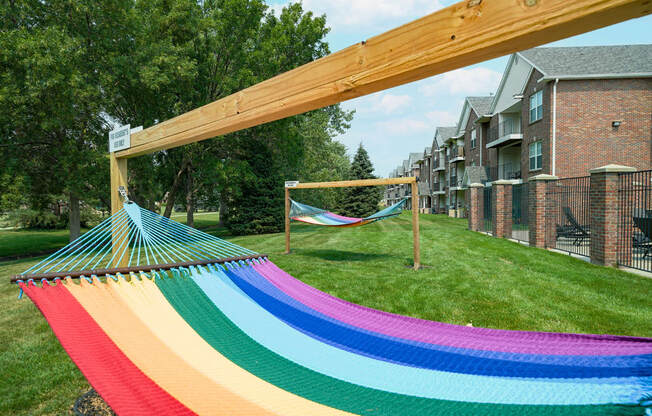 rainbow striped hammock outside the clubhouse at Williamsburg Park apartments in Lincoln