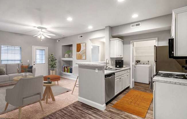 A modern kitchen with white appliances and a dining area with a table and chairs.