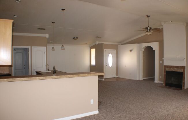 Charming 3-Bedroom Home with Fireplace, Spacious Backyard & Attached Garage in California City!