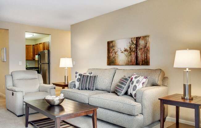 Living Room | Cedars Lakeside Apartments in Little Canada, MN