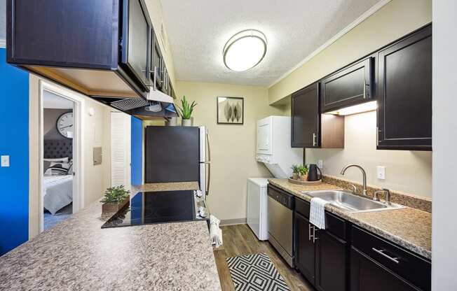 Large Island Kitchen With Custom Cabinetry at The Grove at Lyndon, Louisville, Kentucky