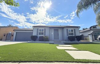 Upgraded 2-Bedroom Home with Garage, Yard & Included Utilities