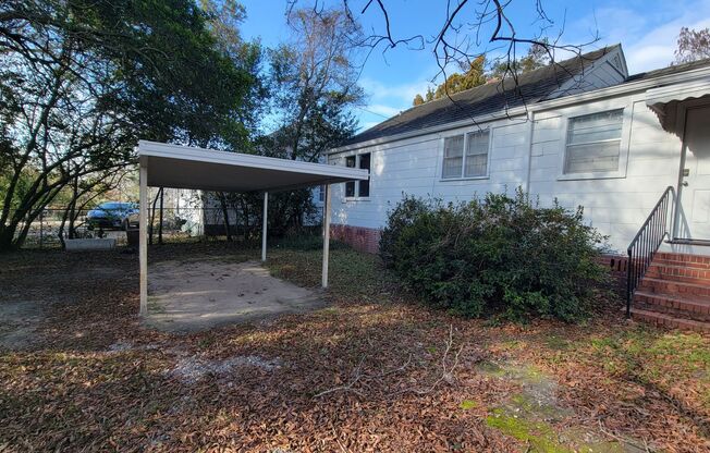 Welcome Home!  Single carport located in back yard as well!