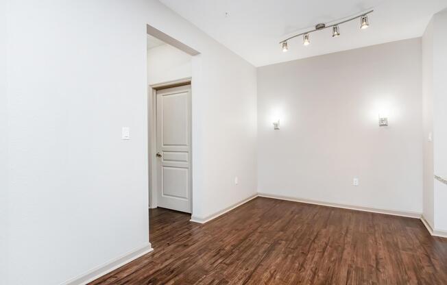 a kitchen with a wood floor