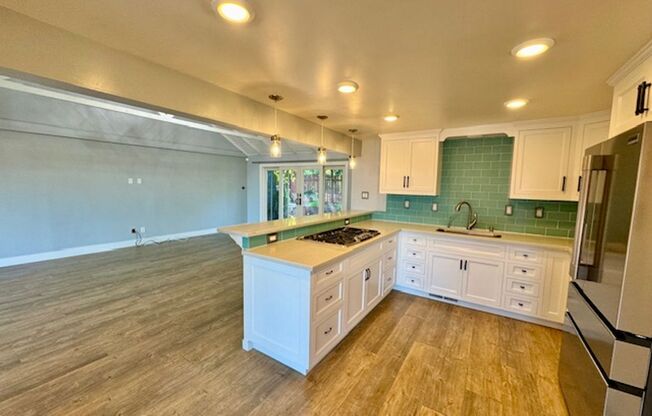 Spacious 2 story updated Orinda home with large bonus room and views!