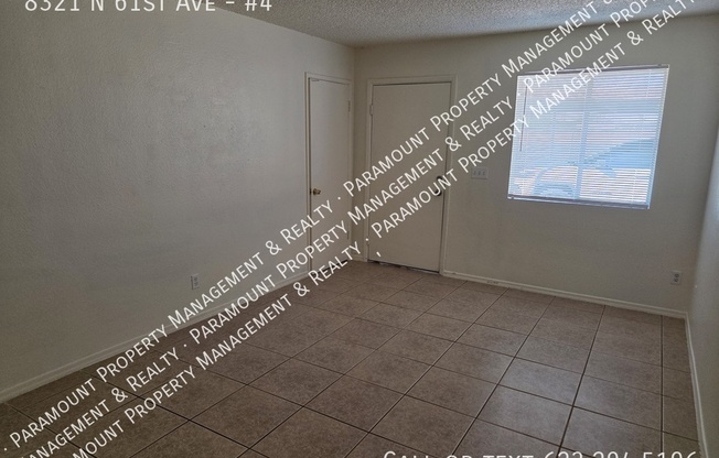 8321 N 61 AVE
