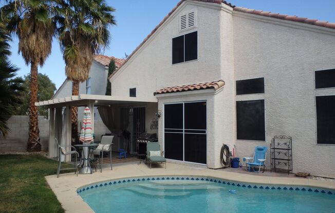 3 bedroom Henderson home with pool on a small cul-de-sac in the heart of Green Valley!