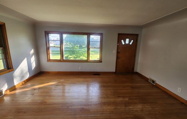 Charming 2 bedroom 1 bath with large rooms and attached carport - unfinished basement!