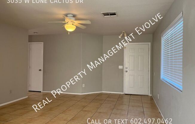 3035 W LONE CACTUS DR