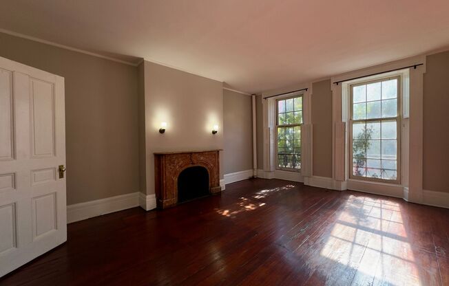 For Rent: Historic Charm at 12 E Madison St – Your Urban Sanctuary Awaits!