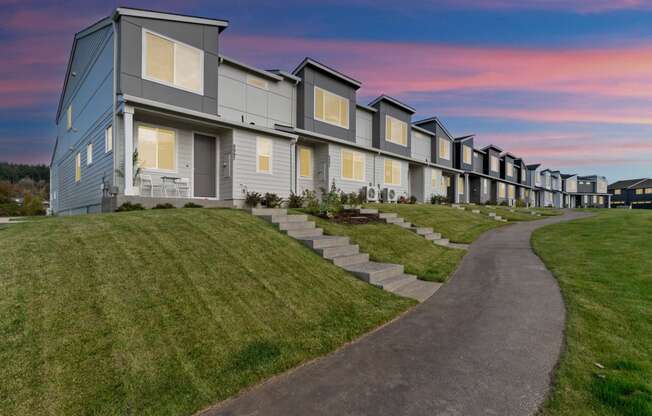 Apartments with a sidewalk in front of it at Thrive at Green Mountain, Washington  , 98607